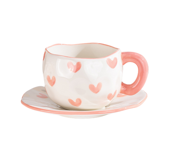 taza ceramica con patron de corazones y plato